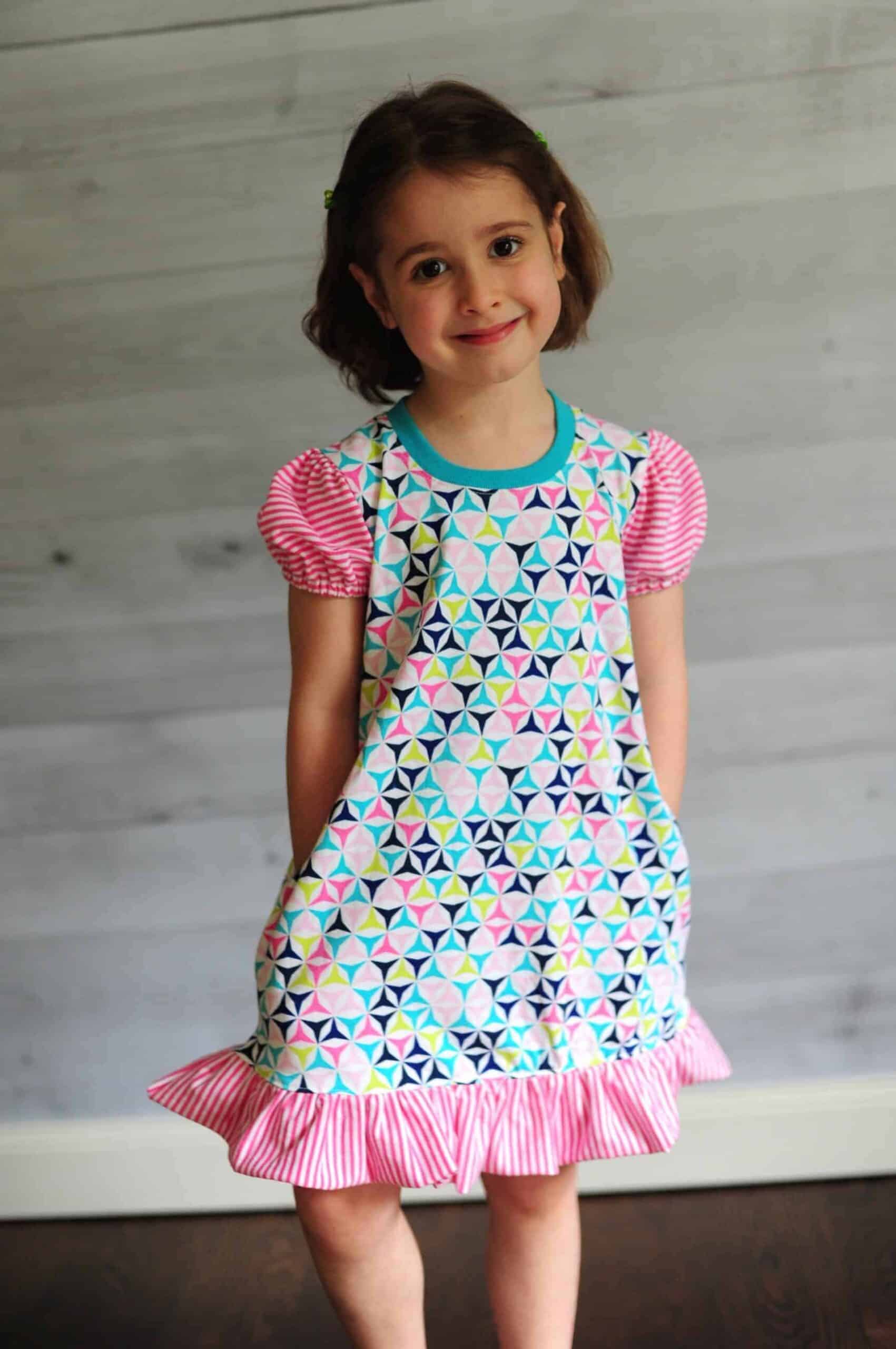 Girls easy dress sewing pattern with sleeve variations.
