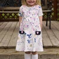 Prisma dress with flared skirt and button boatneck