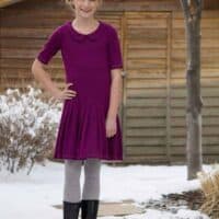 Prisma with pleated skirt and Peter Pan collar